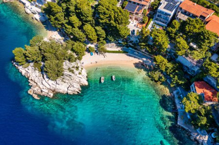 Photo for Amazing aerial view of the beautiful Podrace beach in Brela, Makarska Riviera, Croatia. Aerial view of Podrace beach and waterfront on Makarska riviera, Brela, Dalmatia region of Croatia. - Royalty Free Image