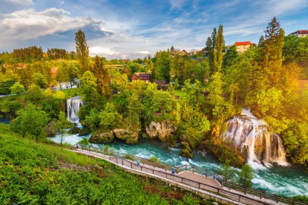 Village of Rastoke near Slunj in Croatia, old water mills on waterfalls of Korana river, beautiful countryside landscape. Landscape with river and little waterfalls in Rastoke village, Croatia.