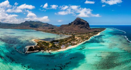 Tropical scenery, beautiful beaches of Mauritius island, Le Morne, popular luxury resort. Le Morne beach luxury resorts, Mauritius. Luxury beach in Mauritius, sandy beach with palms and blue ocean. 