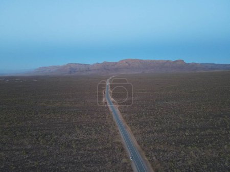 Photo for A bird's eye view of a highway leads to The Grand Canyon - Royalty Free Image