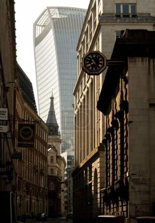Photo for A vertical shot of the Walkie-Talkie between the buildings at sunrise - Royalty Free Image