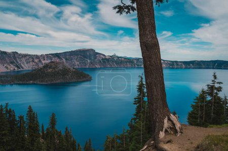 Photo for A mesmerizing view of the cloudy blue sky over the calm lake - Royalty Free Image