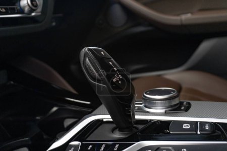 A closeup of a BMW X4 gearshift selector