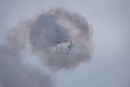 Photo for A low angle of an airplane flying at Bucharest International Air Show (BIAS 2022) - Royalty Free Image