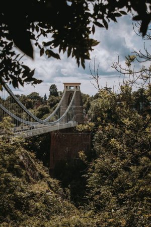 Photo for A beautiful vertical shot of Clifton suspension bridge over the River Avon in Bristol, United Kingdom. - Royalty Free Image