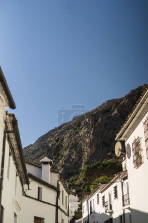 Photo for A vertical shot of a historic alley near mountains in Villaluenga del rosario in Cadiz,Andalucia - Royalty Free Image