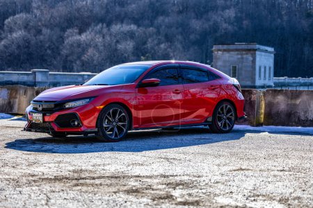 Photo for Luxurious red Honda Civic at Pretty boy Reservoir in MD - Royalty Free Image
