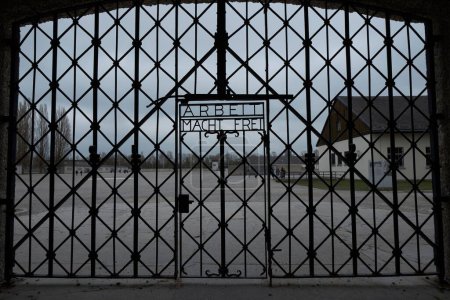 Photo for A metal fence with "Arbeit macht frei" sign - Royalty Free Image