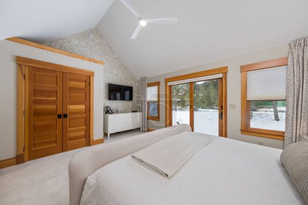 Photo for The beautiful modern bedroom interior design. Custom-built house in the mountains. - Royalty Free Image