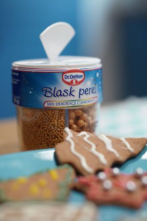 Photo for A vertical shot of the Dr. Oetker package of "Glow of Pearls" full of small sweet round grains for decorating cakes or cookies - Royalty Free Image