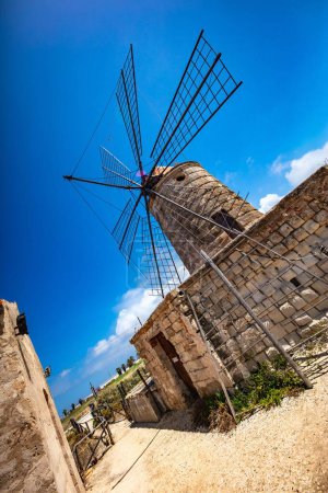 Photo for A vertical shot of an old windmill in Trapani, Sicily - Royalty Free Image