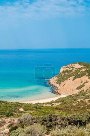 Photo for A vertical aerial view of a beautiful seashore with a rocky cliff in Kef Abbed, Tunisia - Royalty Free Image
