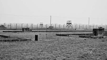 A grayscale view of the exterior landscape of the Auschwitz concentration camp in Oswiecim, Poland
