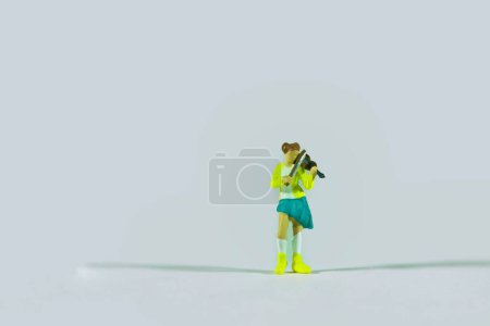 Photo for Street musicians isolated on light background, miniature figures scene - Royalty Free Image