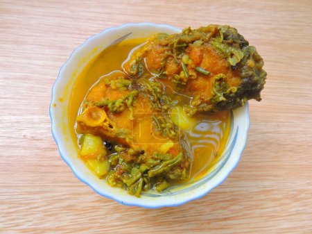 Photo for Famous Assamese recipe called Machor Tenga in Assam. This is a very popular and a signature dish of Assam. - Royalty Free Image