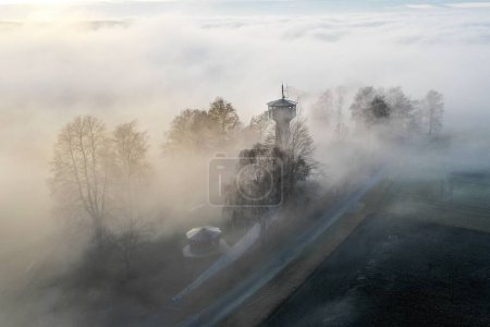 Photo for An aerial view of a city under a foggy sky - Royalty Free Image