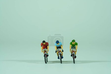 Photo for Racing cyclist isolated on light background, front view - Royalty Free Image