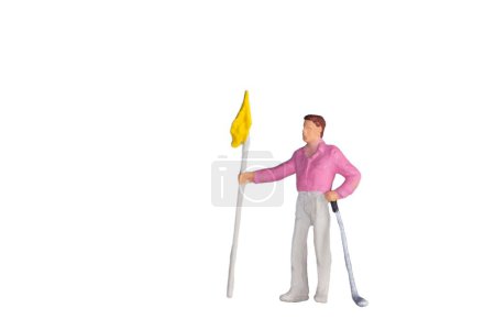 Foto de Golfista con palo de golf y bandera aislada sobre fondo blanco. vista frontal - Imagen libre de derechos
