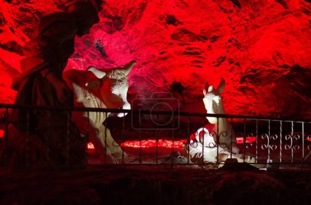 Photo for A beautiful shot of a stone sculpture illuminated with red neon lights in Salt Cathedral of Zipaquira, Colombia - Royalty Free Image
