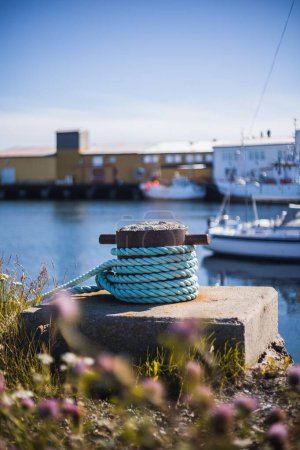 Photo for A vertical shot of the moored rope of the ship - Royalty Free Image