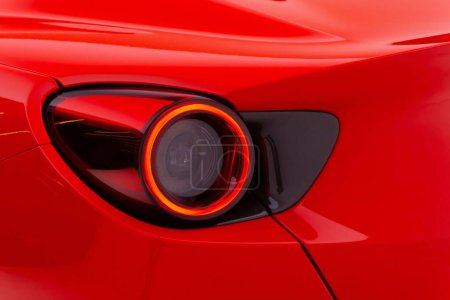 Photo for A closeup shot of details on the Ferrari Portofino Rosso Corsa taillight - Royalty Free Image