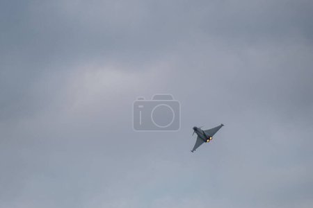 Photo for A low angle of 61-06 airplane flying at Bucharest International Air Show (BIAS 2022) - Royalty Free Image