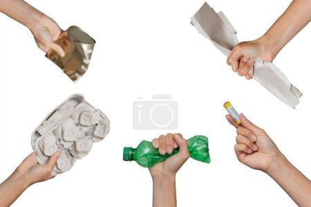 Photo for Recycling Garbage and separate Trash. Hand holding waste cardboard, battery, pet, tin on isolated white background. - Royalty Free Image