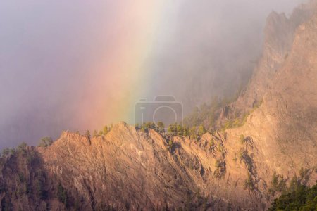 Photo for A beautiful rainbow seen between the rocky hills - Royalty Free Image