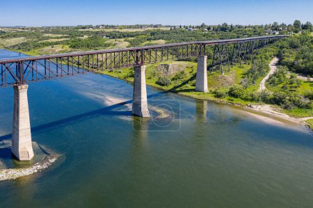 An aerial view over The Sky Trail Bridge by Lake Diefenbaker in Saskatchewan, Canada