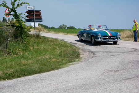 Photo for Urbino italy MERCEDES-BENZ 190 SL 1957 on an old racing car in rally Mille Miglia 2022 the famous italian historical race - Royalty Free Image