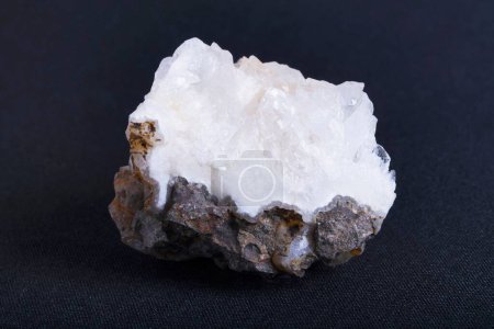 Photo for A closeup view of a crystalline mineral, Quartz on a black background - Royalty Free Image