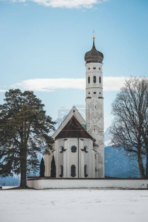 A vertical shot of St Coloman Church. Schwangau, Germany.
