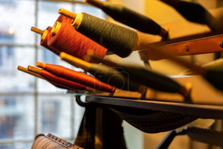 Photo for A selective shot of the spools of colorful threads - Royalty Free Image
