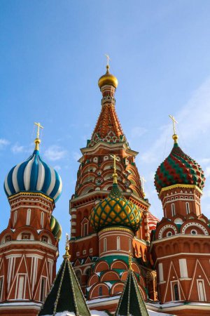 Photo for A vertical shot of St. Basil's Cathedral on blue cloudy sky background in Moscow, Russia - Royalty Free Image