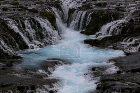 A beautiful scenery of the flowing Bruarfoss waterfall on the Bruara River in Iceland