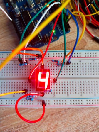 Photo for A vertical top view of number four on seven segment display breadboard - Royalty Free Image