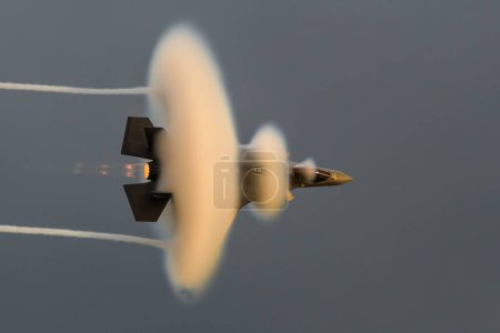 Photo for A stealth fighter from Lakenheath flying at Sanicole sunset airshow - Royalty Free Image