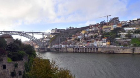 Photo for The beautiful Dom Luis I Bridge between the cities of Porto and Vila Nova de Gaia in Portugal - Royalty Free Image