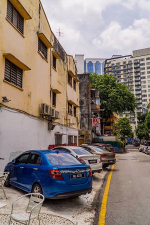Photo for A vertical of old apartments and new buildings near Bukit Bintang, Kuala Lumpur, Malaysia - Royalty Free Image