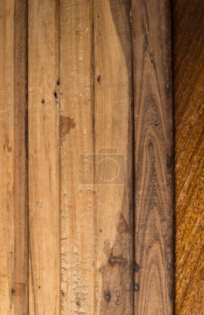 Photo for A vertical closeup of weathered brown wooden texture - Royalty Free Image