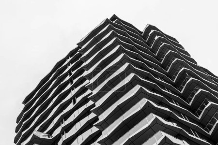 Photo for A low angle shot of the modern futuristic building in black and white - Royalty Free Image