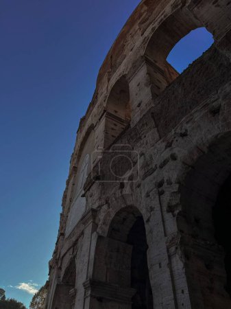 Photo for A vertical low-angle shot of a part of the ancient Colosseum - Royalty Free Image