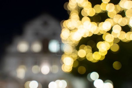 Photo for The town hall from Brilon behind the big Christmas tree on the market square. Beautiful bokeh background - Royalty Free Image