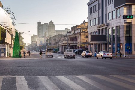 Photo for View down a main road through central Yangon, Myanmar, in the early morning. - Royalty Free Image