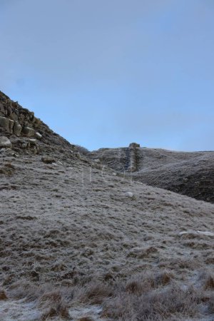 Photo for The remains of the Hadrian's Wall in Northumberland National Park on a frosty winter day - Royalty Free Image