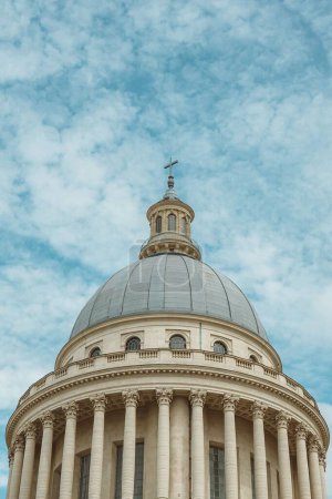 Photo for A vertical low-angle of the Pantheon monument dome against cloudy sky background - Royalty Free Image