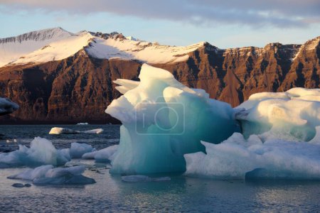 Photo for The view of the icebergs floating on the water's surface. Beautiful glacial lake in Iceland. - Royalty Free Image