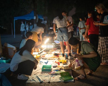 Photo for Flea market for college graduates at night, Wuhan, China - Royalty Free Image