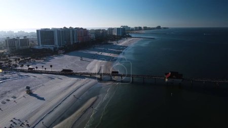 Photo for An aerial view of Florida beach surrounded by buildings and water - Royalty Free Image