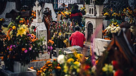 Photo for A crowd gathered in a cemetery in Mexico City for Day of the Dead parade - Royalty Free Image